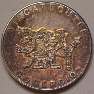 Coin picture of obverse of a 1 ounce silver Yiacatecutli Comercio of Mexico medal 1978