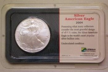 Coin picture of obverse of a 1 ounce silver US Eagle 1 Dollar 2004 sealed version